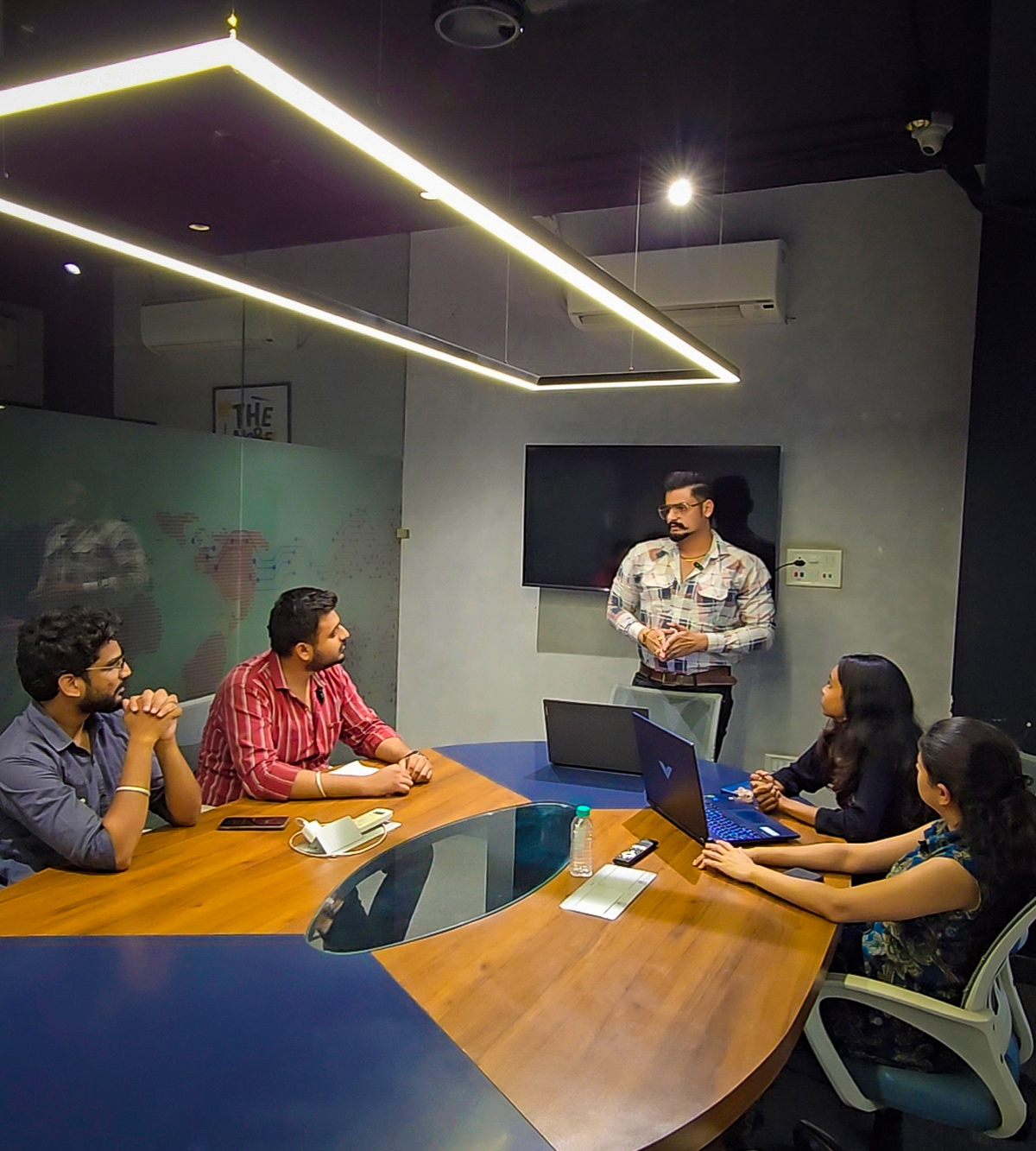 IntelliaTech team collaborating on digital products